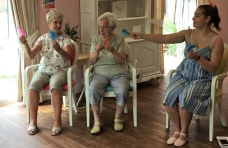 care home activities - Portsmouth care home Hartford Court welcomes dance company Golden Toes to provide seated dance classes for the residents. 