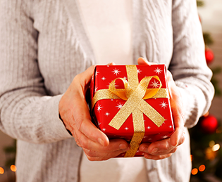 elderly lady with Christmas gift