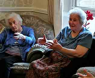 Hazelgrove Court Care Home residents Susan Turner and Pat Keleher take part in a Rainbow Tai Chi session