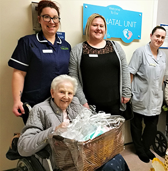 The Beeches Care Home deputy manager Rachel Harris, home manager Jess Brown and carer Amy Trattles with resident Janet Wren when they dropped off donations to the neonatal unit at University Hospital of North Tees on Random Act of Kindness Day.