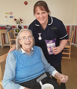 Staff and resident at International Nurses Day