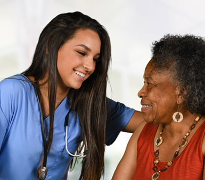 Nurse with patient thinking about career in care