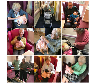 Care home residents participating in Doll Therapy