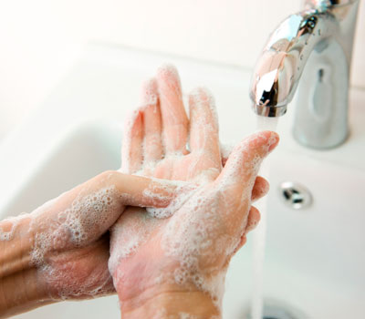 Hand hygiene - a woman washing her hands