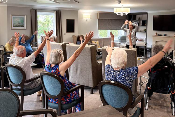 residents doing chair exercises